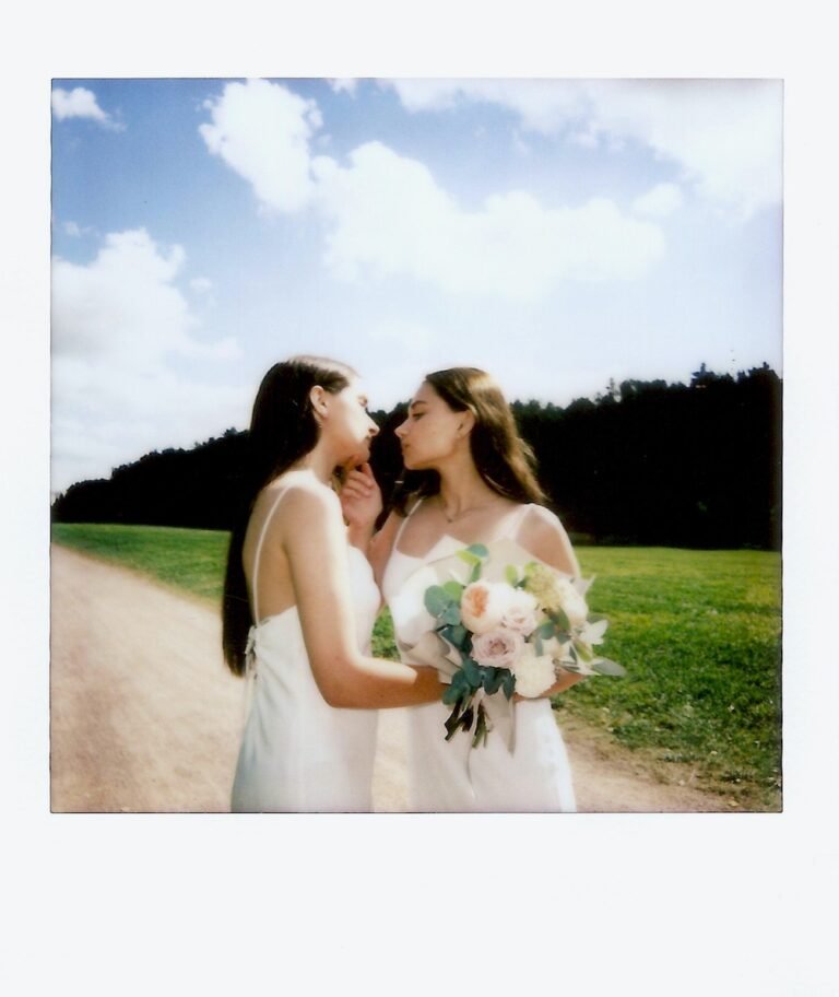 Polaroid Photo of a Couple Kissing